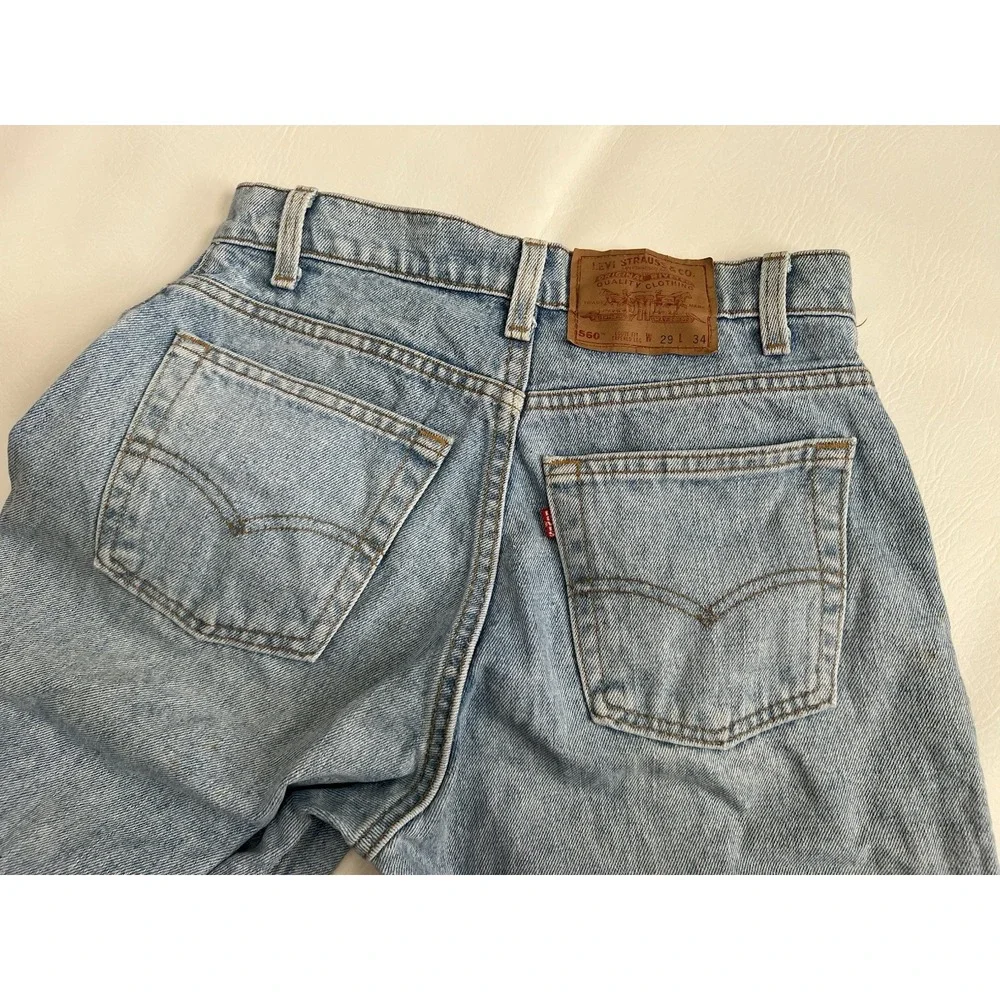 Vintage 90s Levis 560 Loose Fit Tapered Leg Jeans 29x34 Made in USA Light Wash
